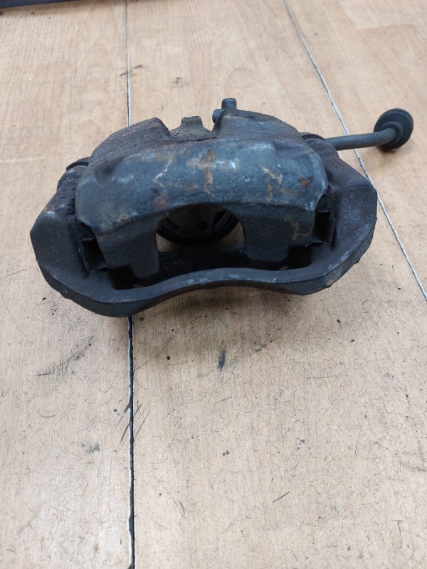 Тормозной суппорт Opel Corsa D 2006-2014 Z14XEP Перед. Лев.