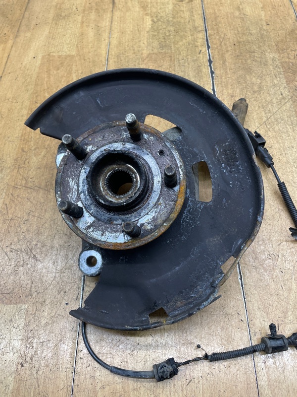 Поворотный кулак Opel Astra J 2010 A16XER Перед. Лев.