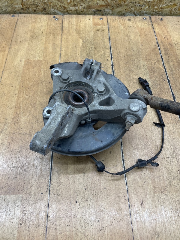 Поворотный кулак Opel Astra J 2010 A16XER Перед. Лев.