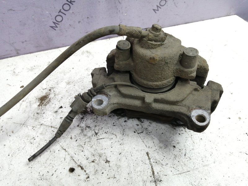 Тормозной суппорт Volkswagen Passat B6 2006 седан Перед. Лев.