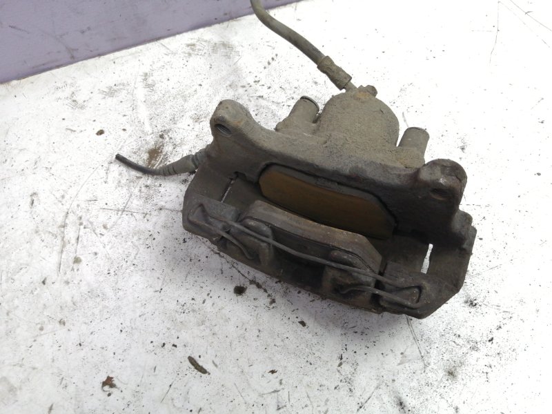 Тормозной суппорт Volkswagen Passat B6 2006 седан Перед. Лев.