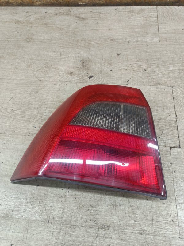 Фонарь Opel Vectra B 1999 X18XE1 1.8 седан 4дв., Задн., Лев. - изображение 1