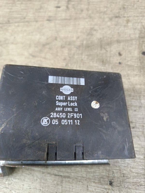 Блок управления центральным замком Nissan Primera 1996 седан 4дв. GA16DE