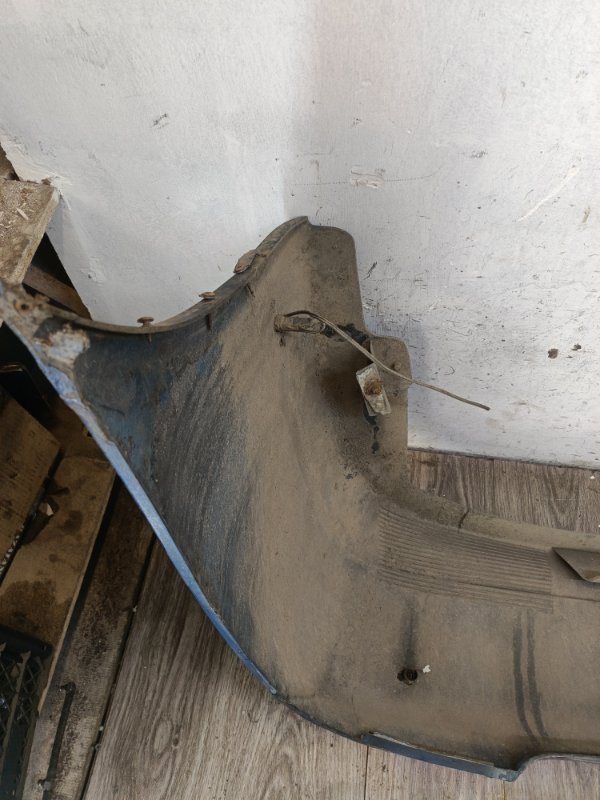 Бампер Nissan Primera 1999 седан 4дв. QG18DE Задн.