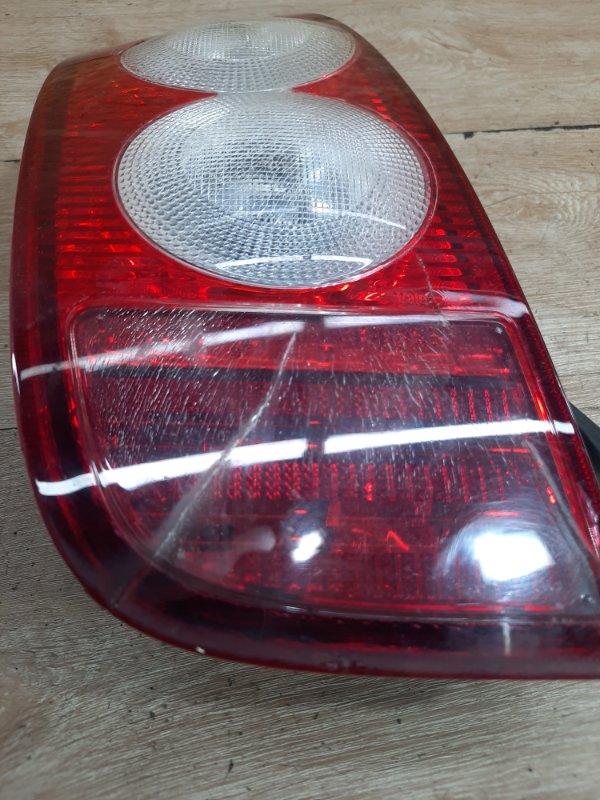 Фонарь Nissan Micra 2003 хетчбэк 3дв. CR12DE Задн. Лев.