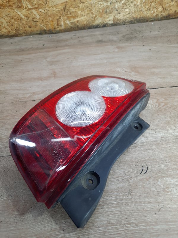 Фонарь Nissan Micra 2003 хетчбэк 3дв. CR12DE Задн. Лев.