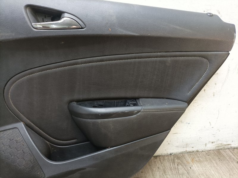 Обшивка двери Opel Astra J 2014 хетчбэк 5дв. A14XER 1.4 Задн. Прав.