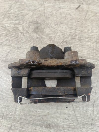 Тормозной суппорт Opel Tigra 1996 X14XE 1.4 купе, Перед., Лев.