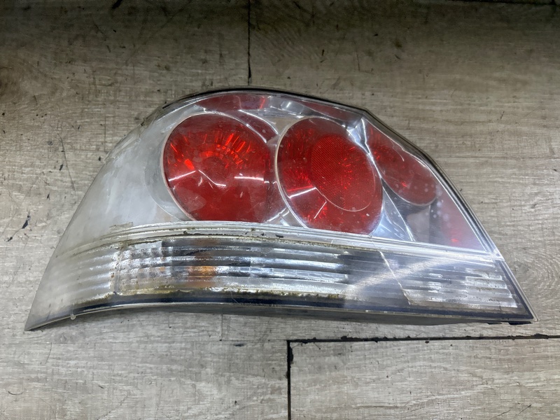 Фонарь Mitsubishi Lancer 2005 4G13 седан 4дв., Задн., Лев.